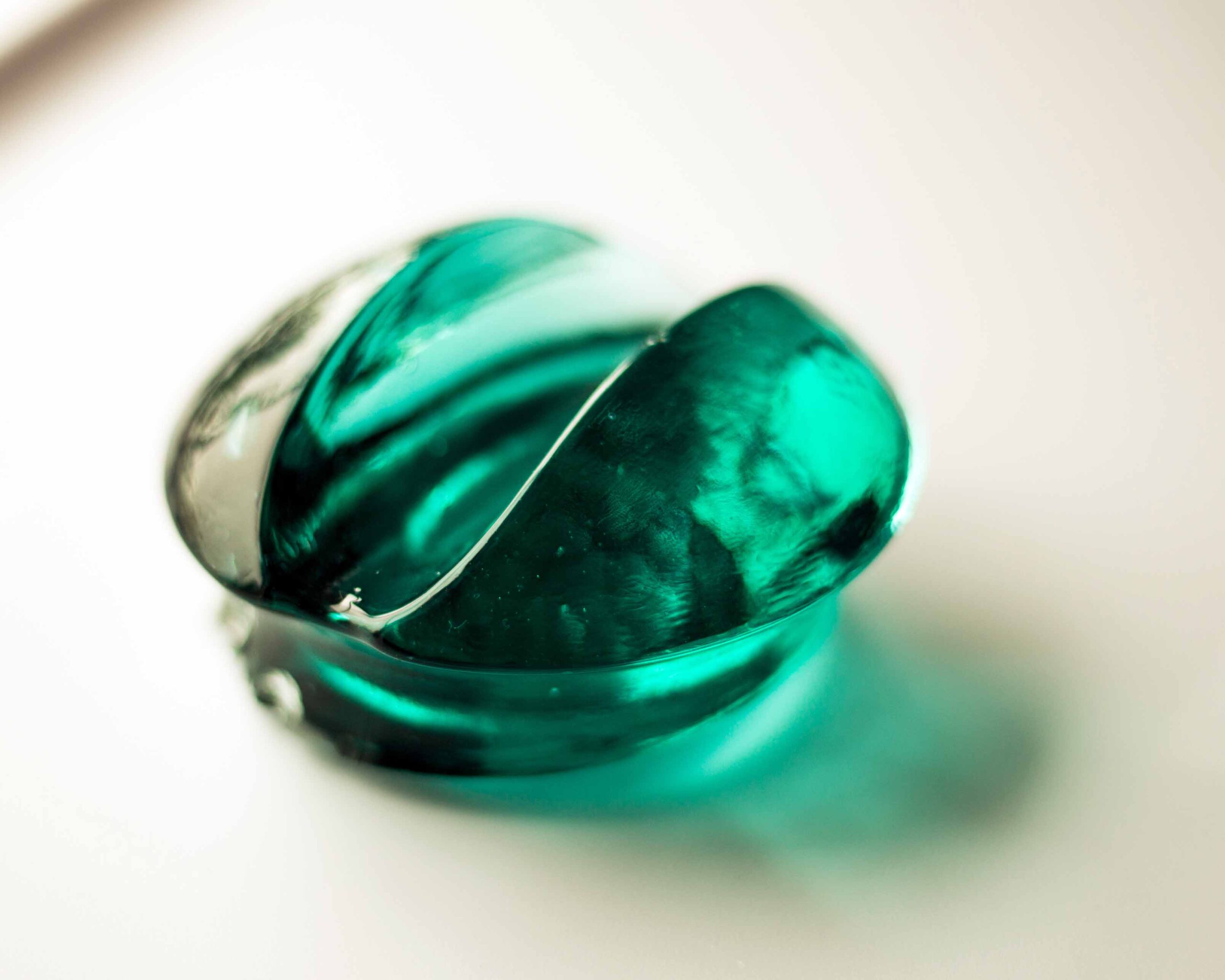 Old green glass electrical insulator found near Buntzen Lake
